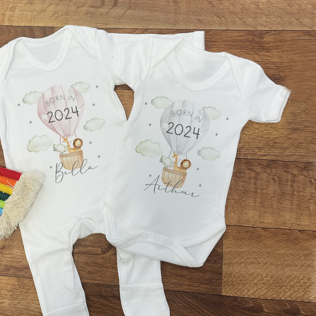 
                  
                    Personalised Born in *Year* Jungle Baby Vest & Sleep Suit
                  
                