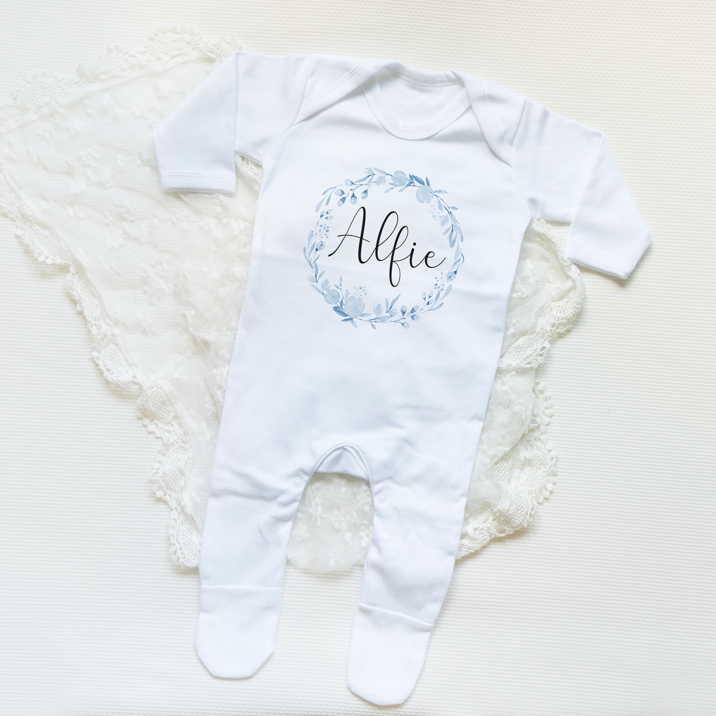 
                  
                    Personalised Floral Wreath Name Baby Vest
                  
                